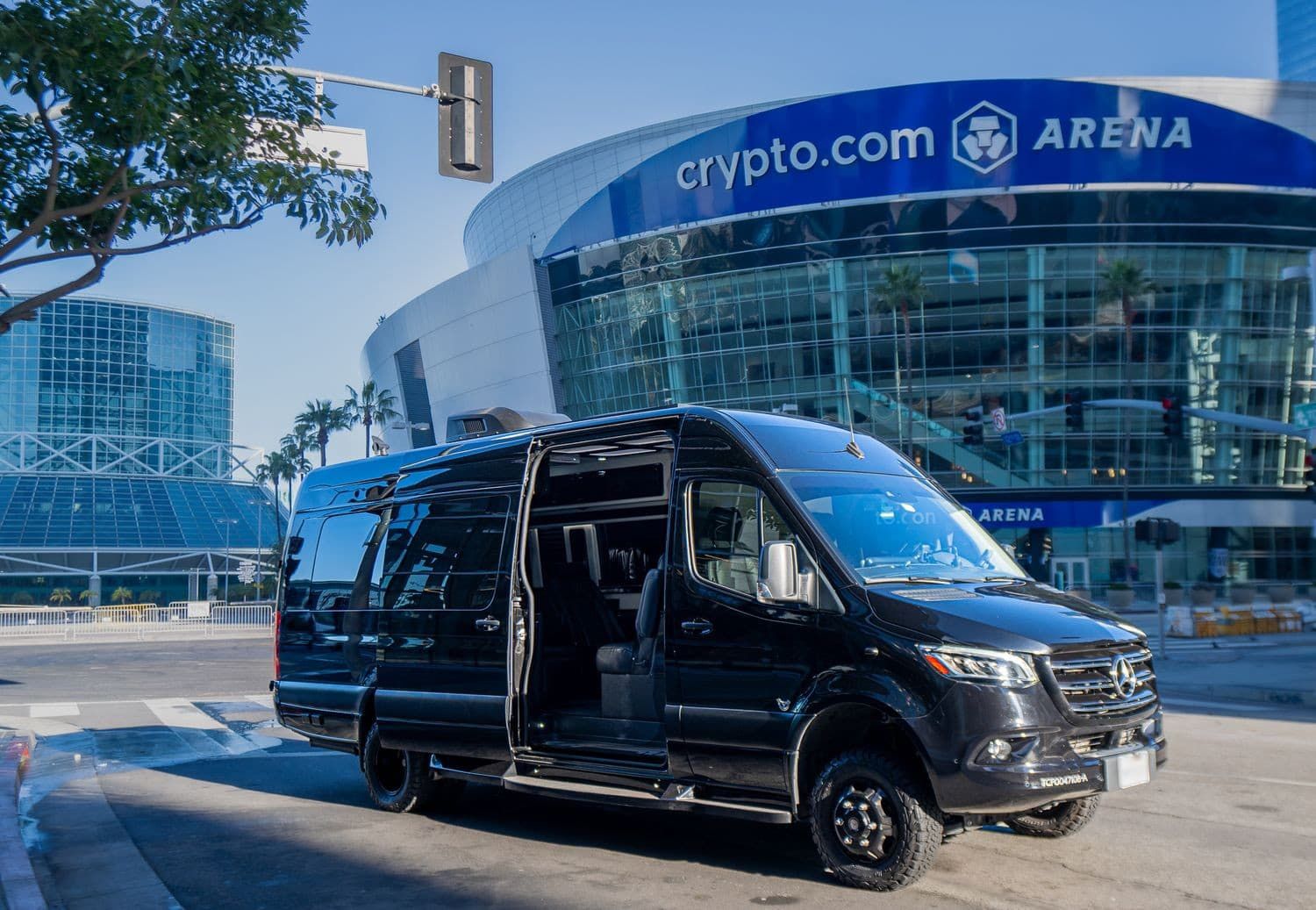 Black van outside Crypto.com Arena in daytime.